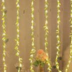 Cortina de Luzes Natalinas com Folhas – Encanto e Magia em Cada Detalhe