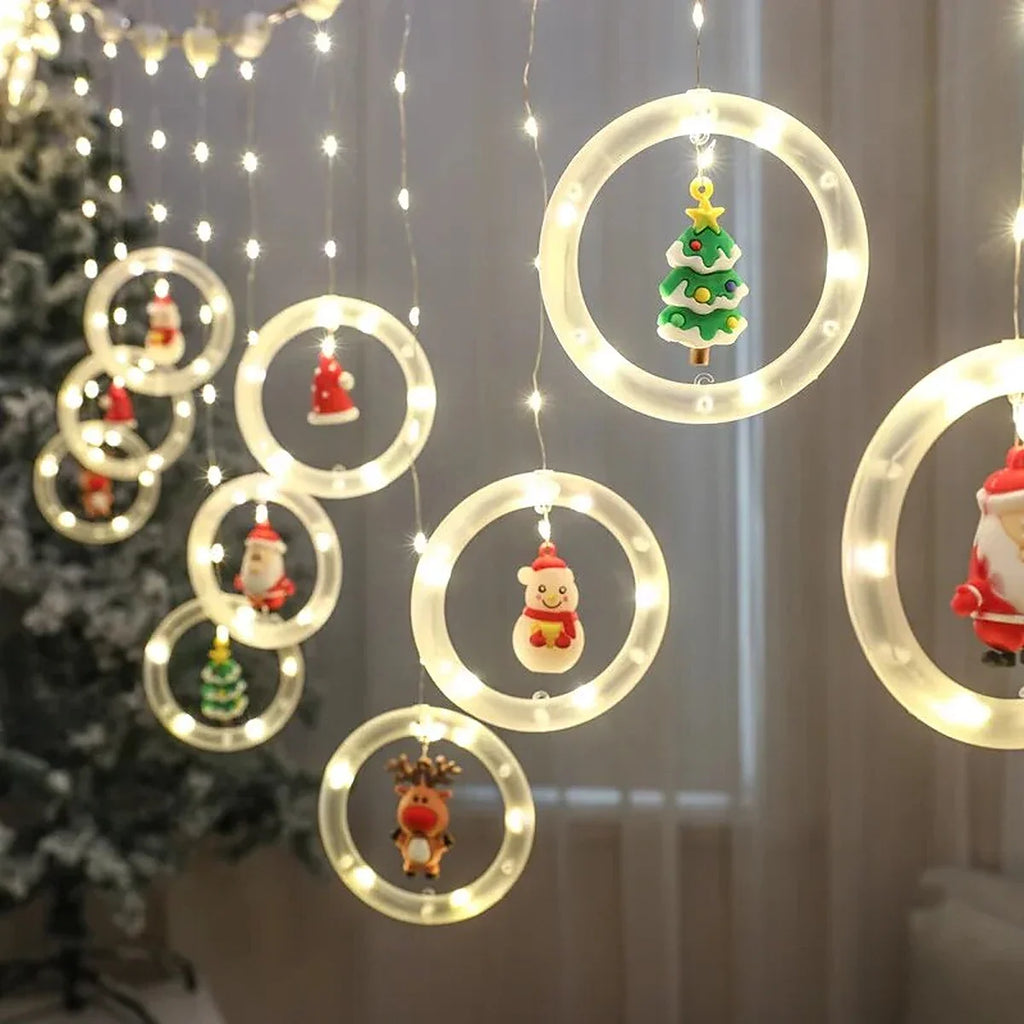 Cortina de Luzes LED com Figuras Natalinas – Argolas, Árvores, Corações e Estrelas