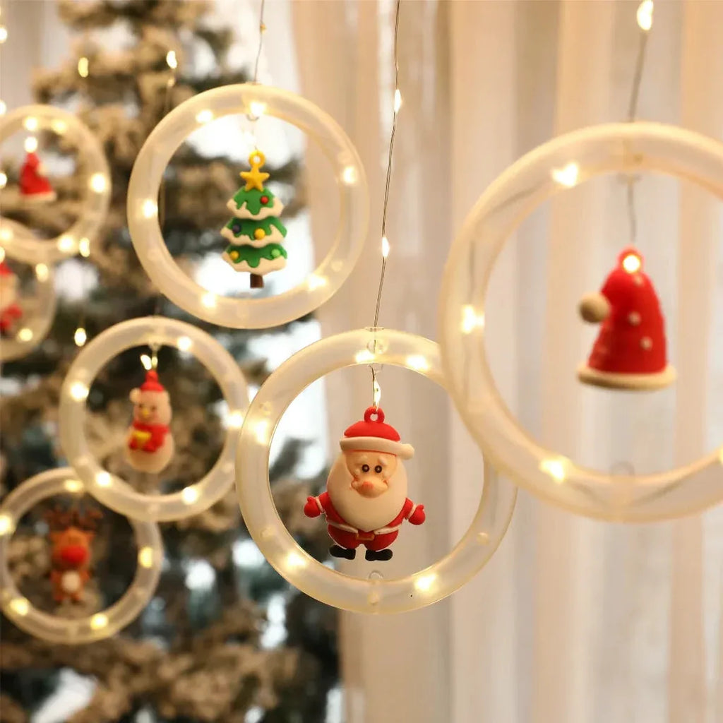 Cortina de Luzes LED com Figuras Natalinas – Argolas, Árvores, Corações e Estrelas